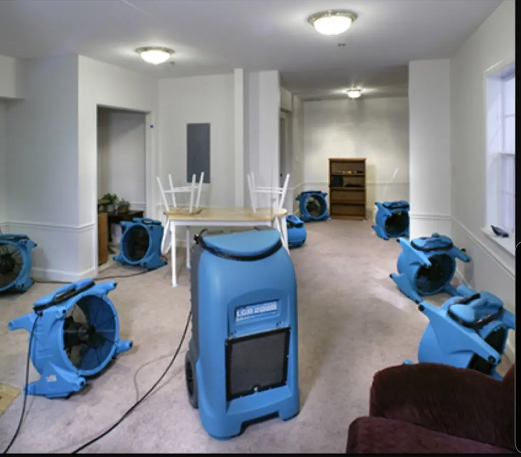 Air movers and dehumidifier setup for Water Damage Restoration in Superior